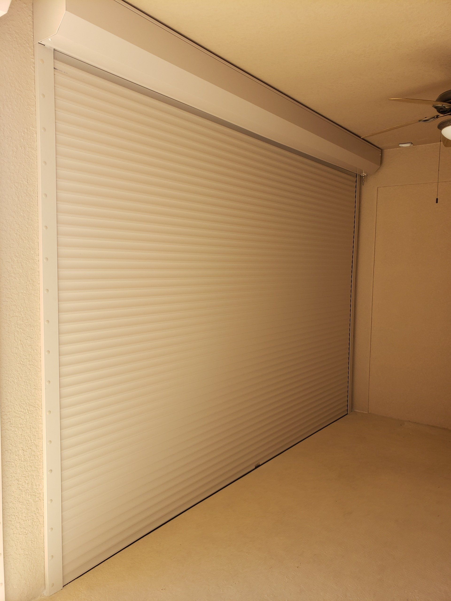 Rolled Down Shutter Beside A Lanai — Reliable Shutter Co., Inc. — Venice, Florida