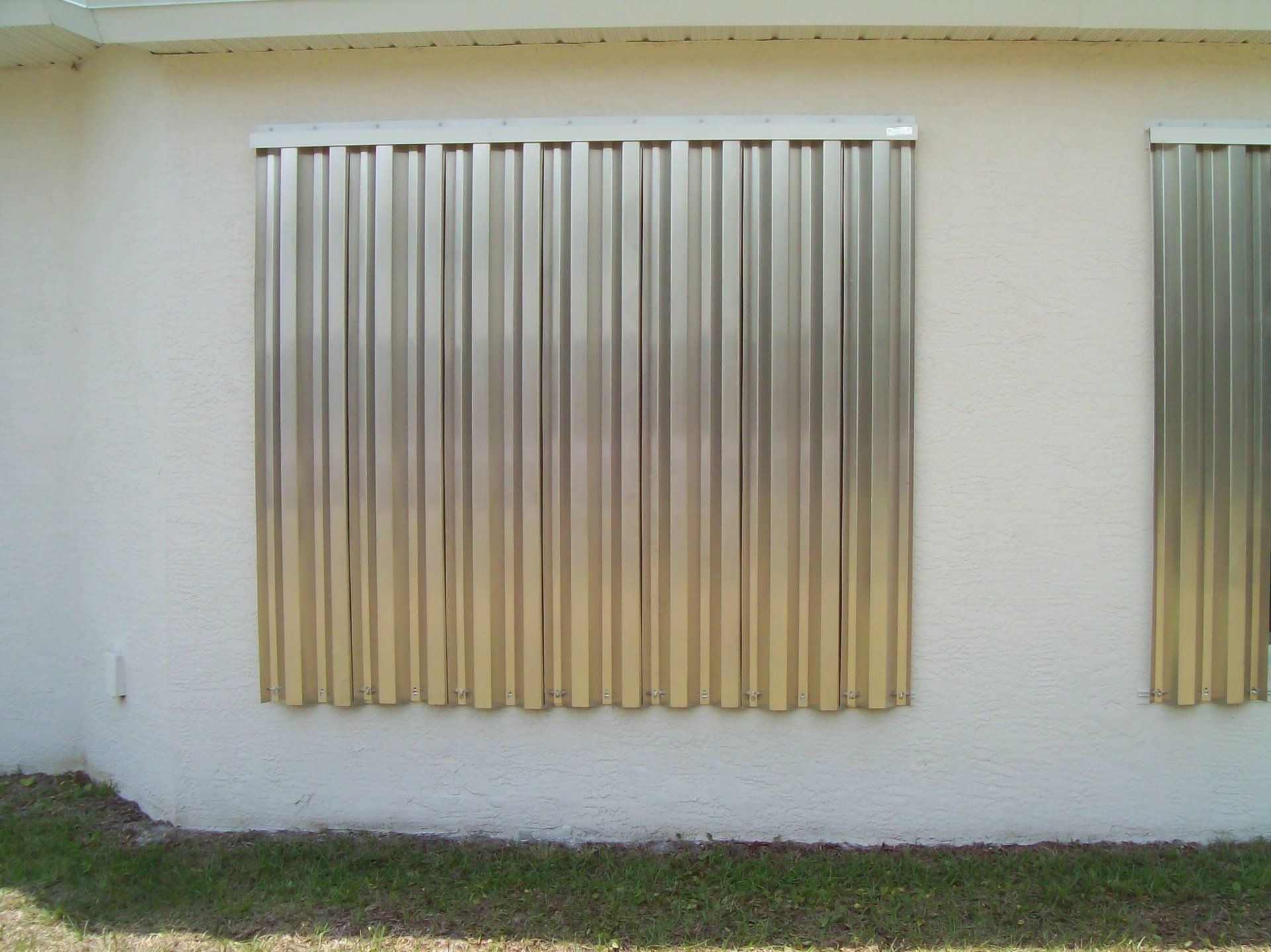 Metal Panel Installed On A Window — Reliable Shutter Co., Inc. — Venice, Florida