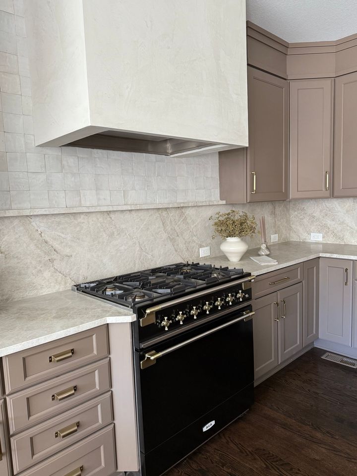 a kitchen with granite counter tops and a sink .