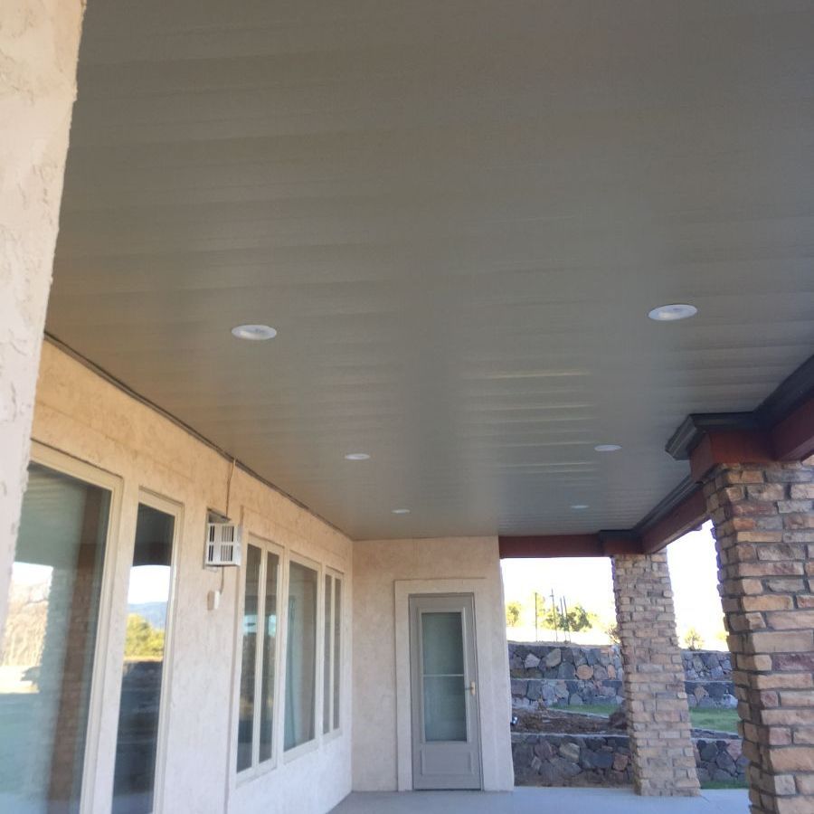 a porch with a gray ceiling rain-out water proof