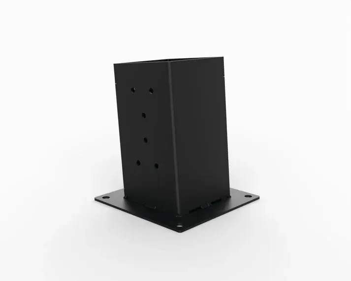 A black metal post with holes in it is sitting on a white surface.