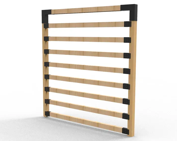 A wooden fence is sitting on a white surface.