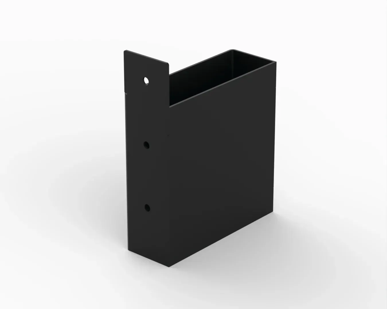 A black box with two holes in it is sitting on a white surface.