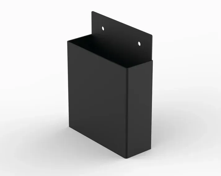 A black box is sitting on a white surface.