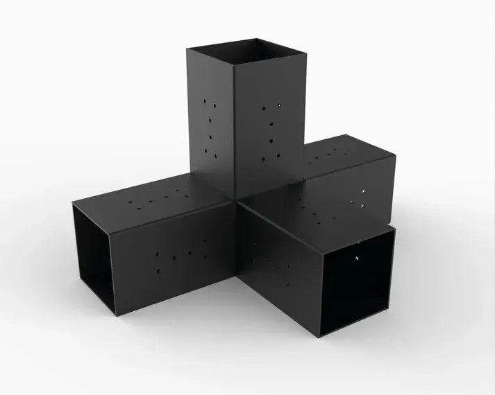 Four black boxes are stacked on top of each other on a white surface.