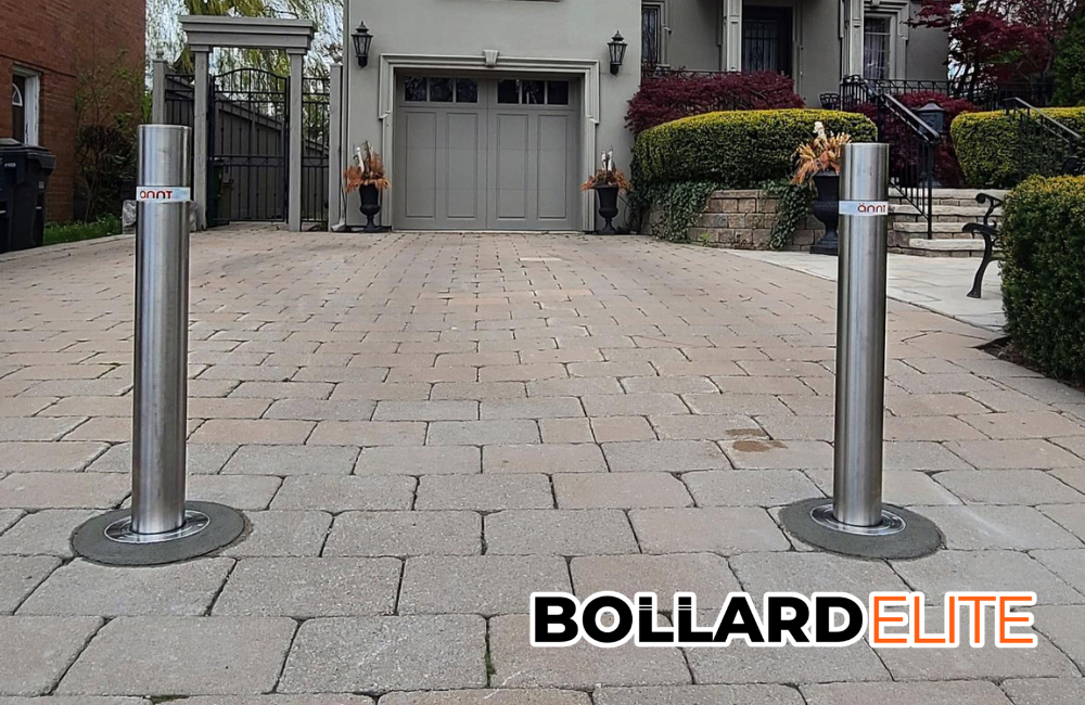 Bollards in a driveway that says bollard elite