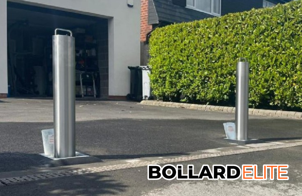 Bollards in a driveway with the word bollard elite on the bottom