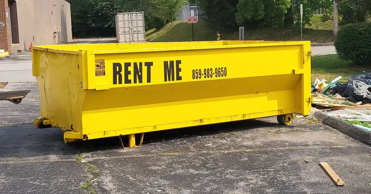 16-yard roll-off dumpster rental in Central Kentucky placed on commercial lot
