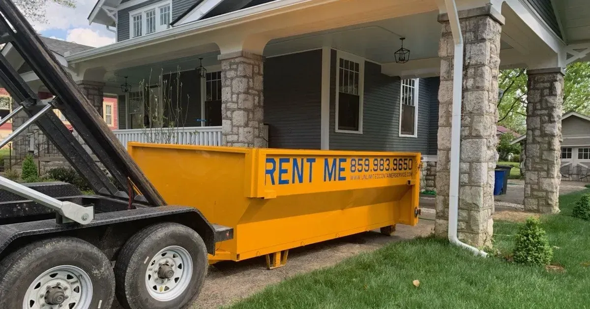 Yellow roll-off dumpster rental for a home renovation in Frankfort, KY