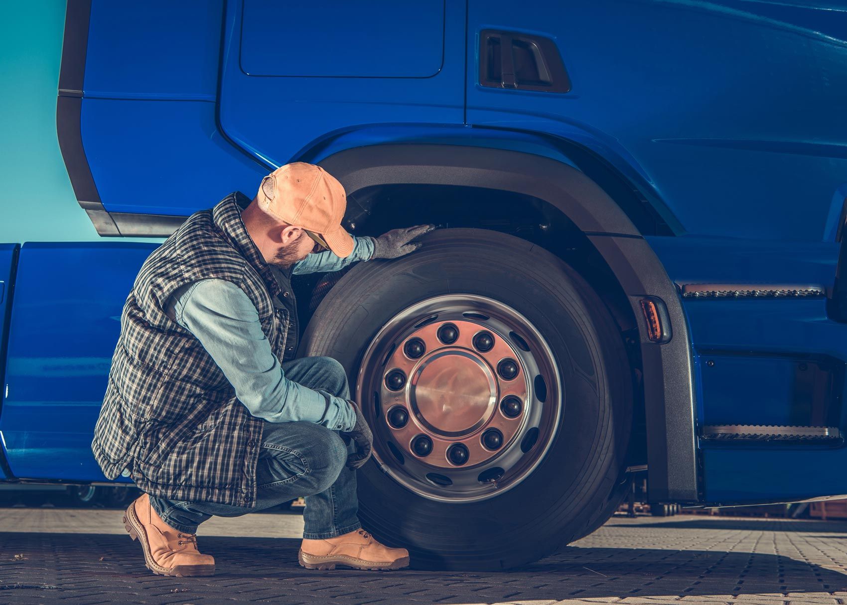 Checking Tire — Zanesville, OH — Goody’s Garage Checking Tire — Zanesville, OH — Goody’s Garage