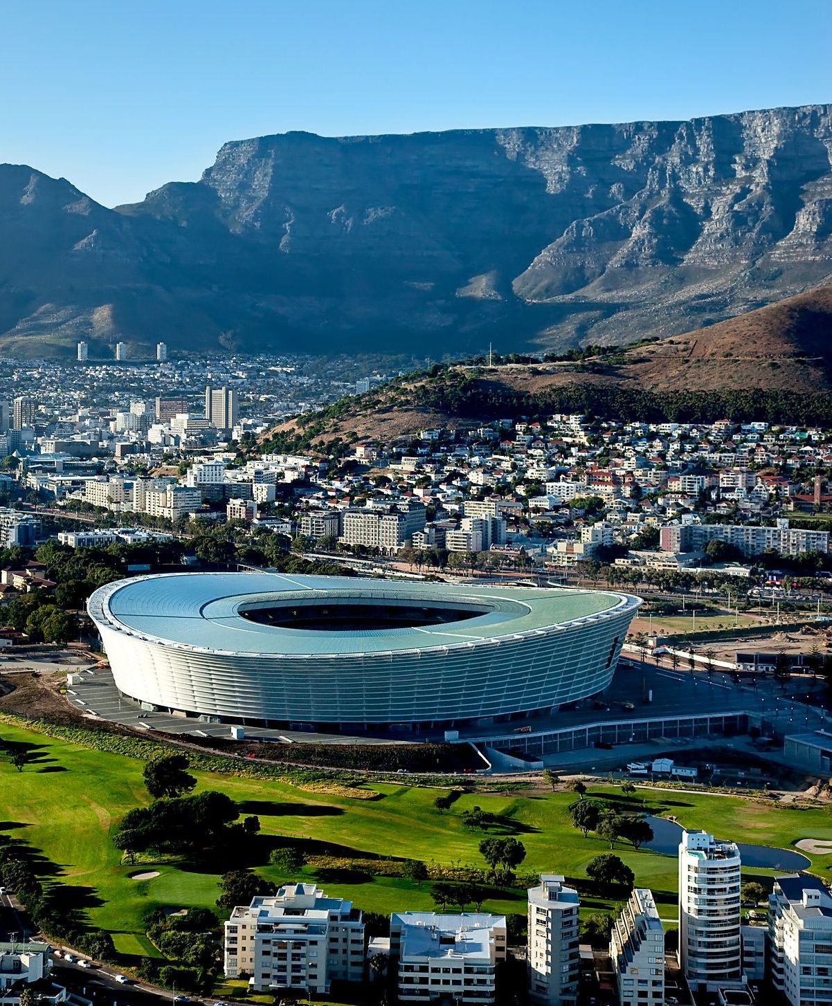 Cape Town Stadium with city and Table Mountain in the background.