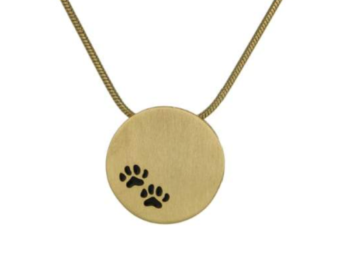 Gold round pendant necklace with black paw prints
