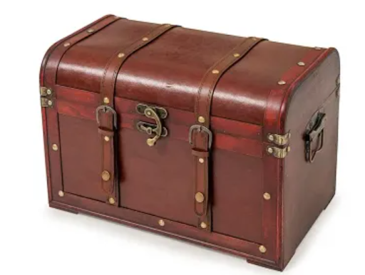 Brown leather treasure chest with brass hardware and latch on a white background