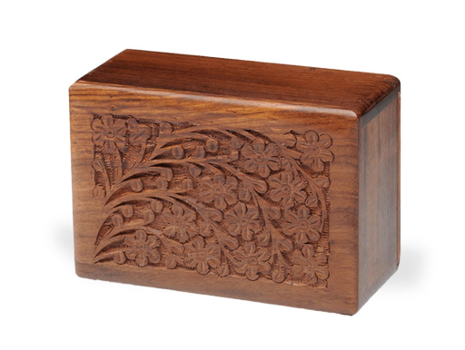 Wooden carved jewelry box with floral pattern on the front panel
