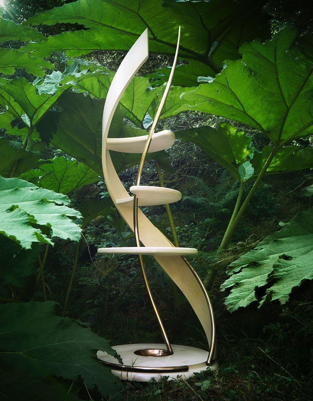 A custom build sycamore sculpture in the middle of a forest designed by sebastian blakeley designs