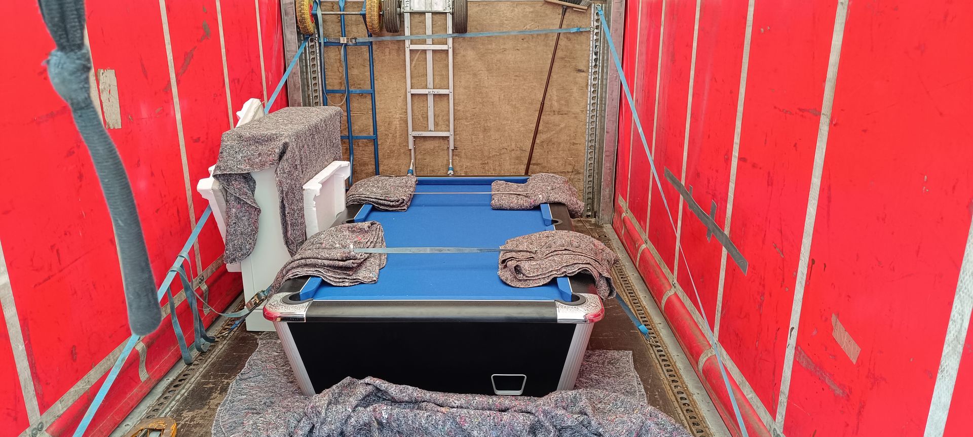 Pool table relocation.