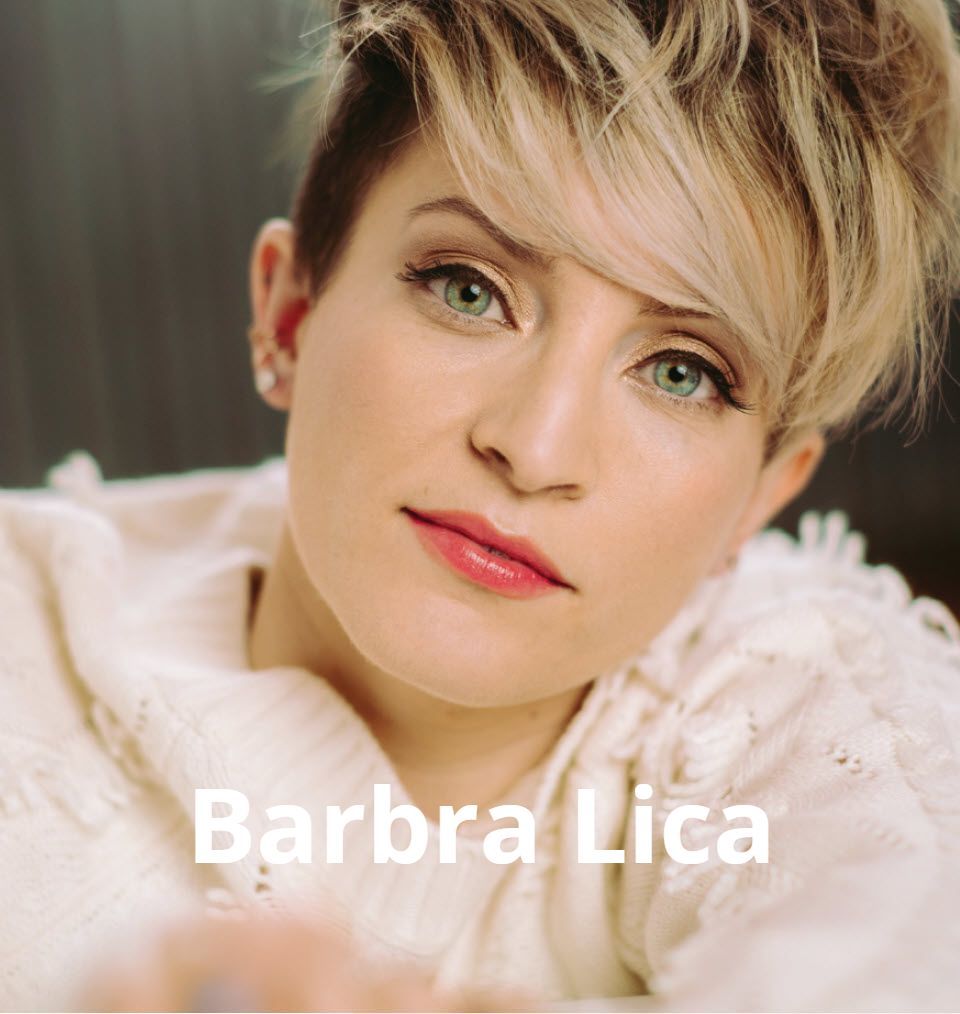 A close up of a woman 's face with the name barbra lica above her