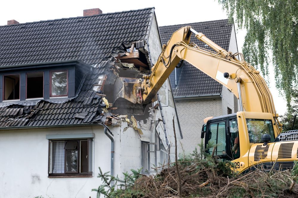 Excavator Demolishing a House — Bigfoot Earthmoving In Mullumbimby, NSW
