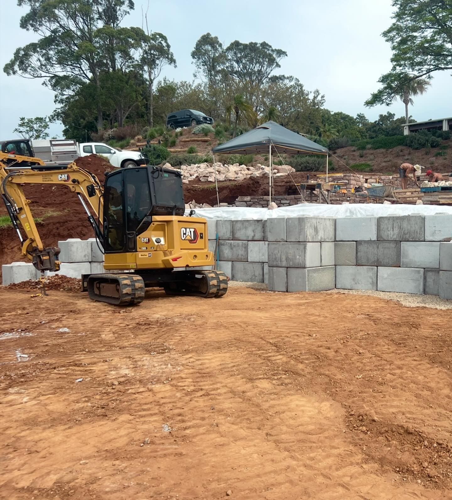 Yellow Cat Excavator on Construction Site — Bigfoot Earthmoving In Byron Bay, NSW