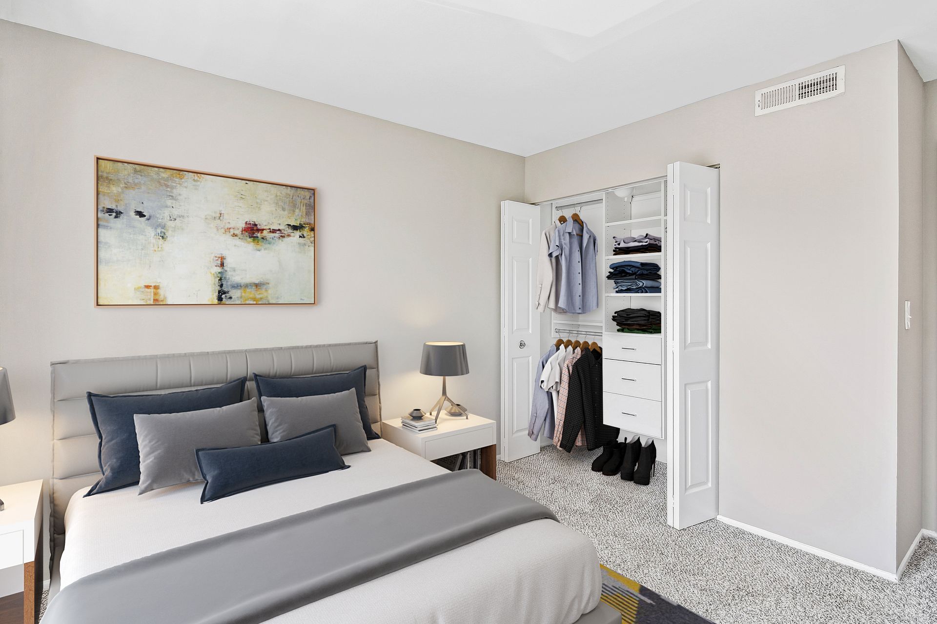 a bedroom with a large bed and a walk in closet .