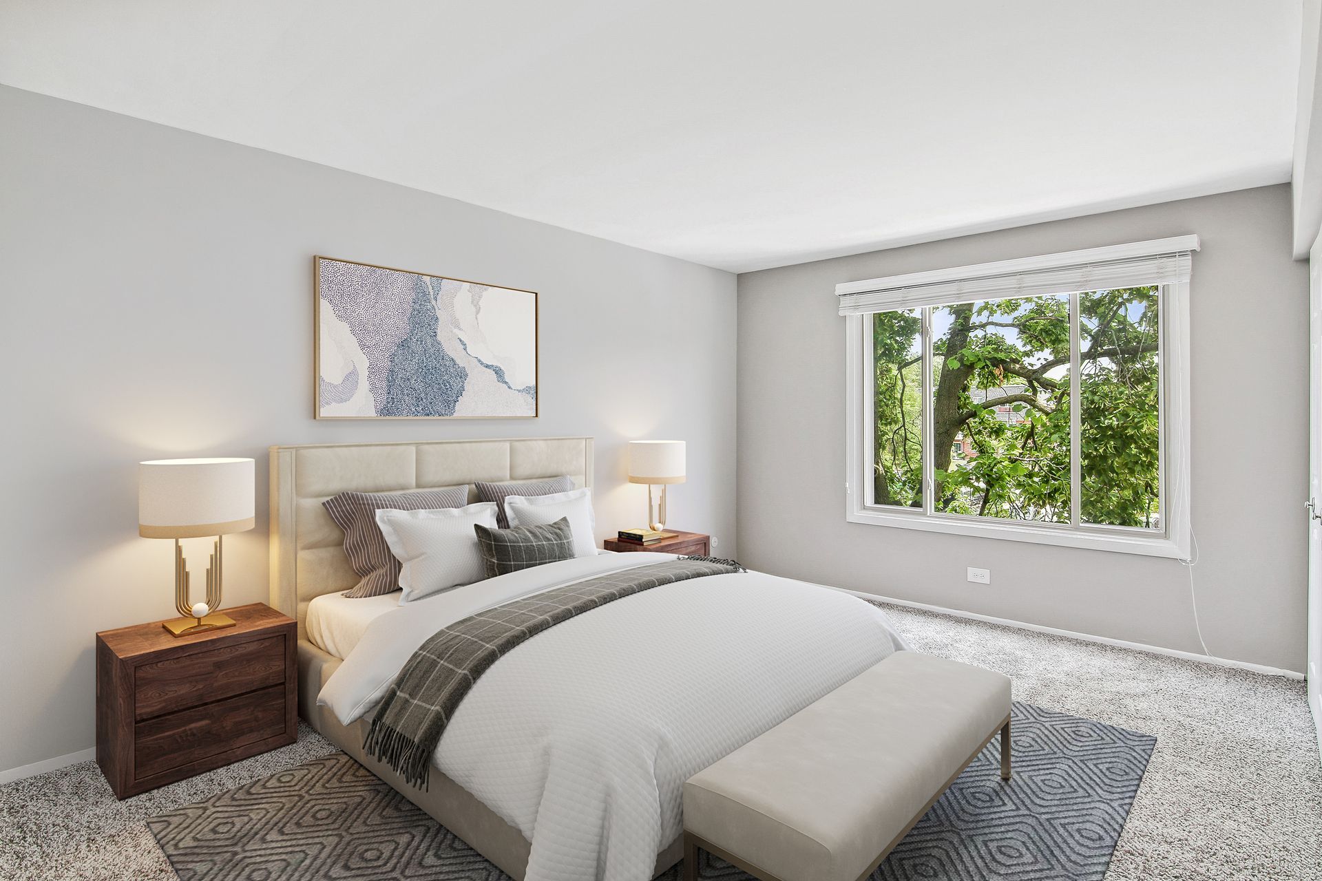 a bedroom with a bed , nightstands , lamps and a window .