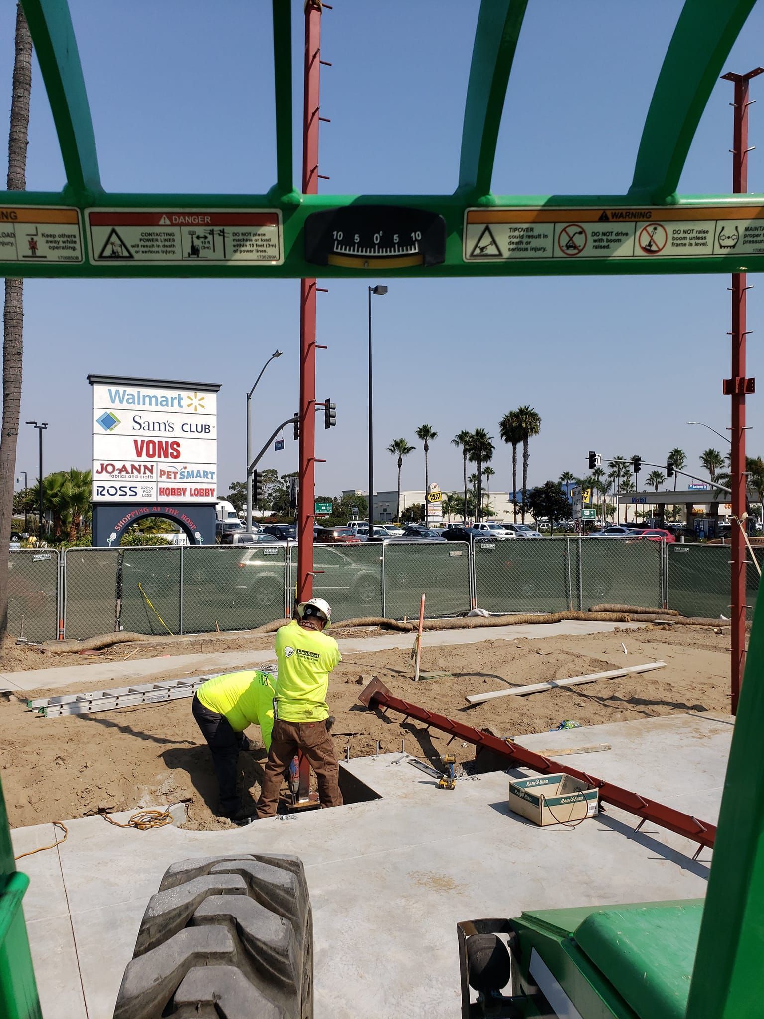 A construction site with a sign that says toys on it