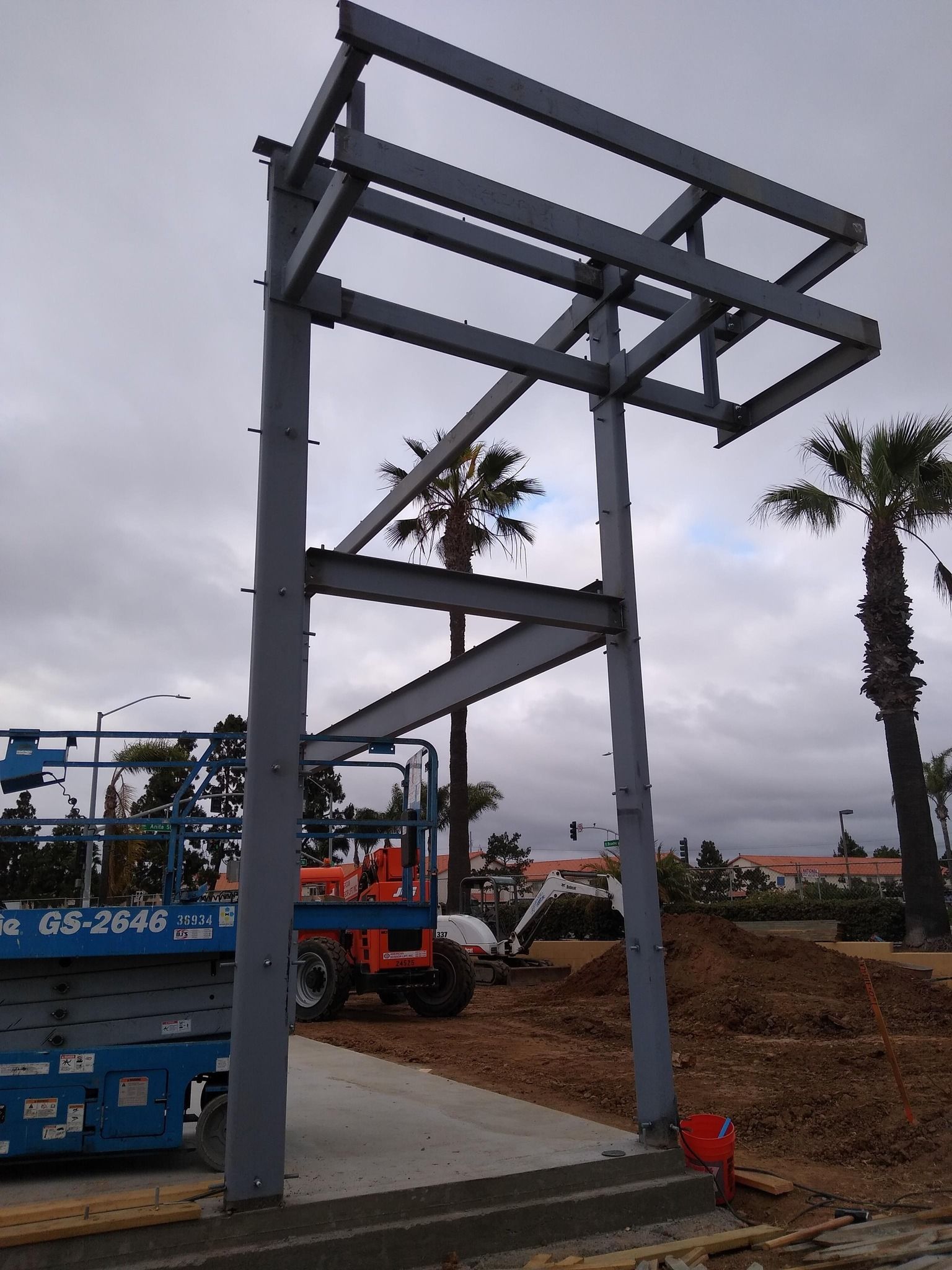 A blue scissor lift with gs2848 on the side of it
