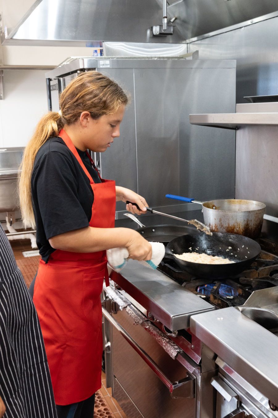 women cooking in kitchen