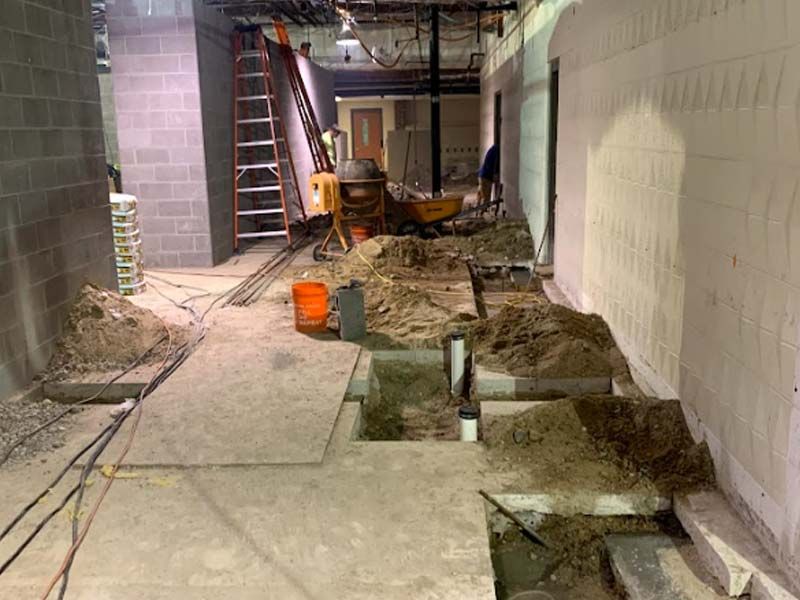 gutting-an-interior-space-down-to-the-steel-frame_-removing-concrete_-commercial-interior-demolition