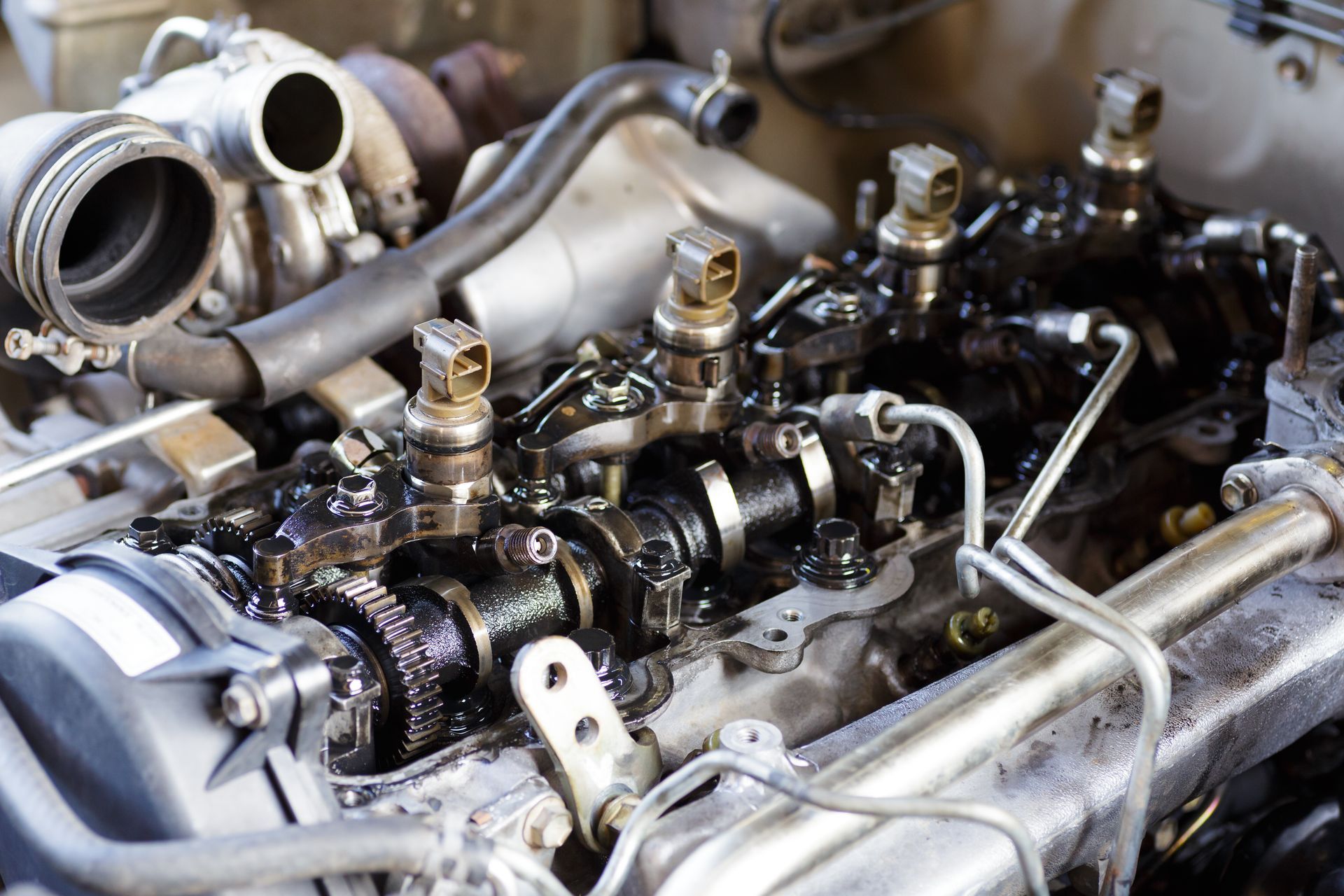 Mechanic working on engine | Lyons Precision Auto Care