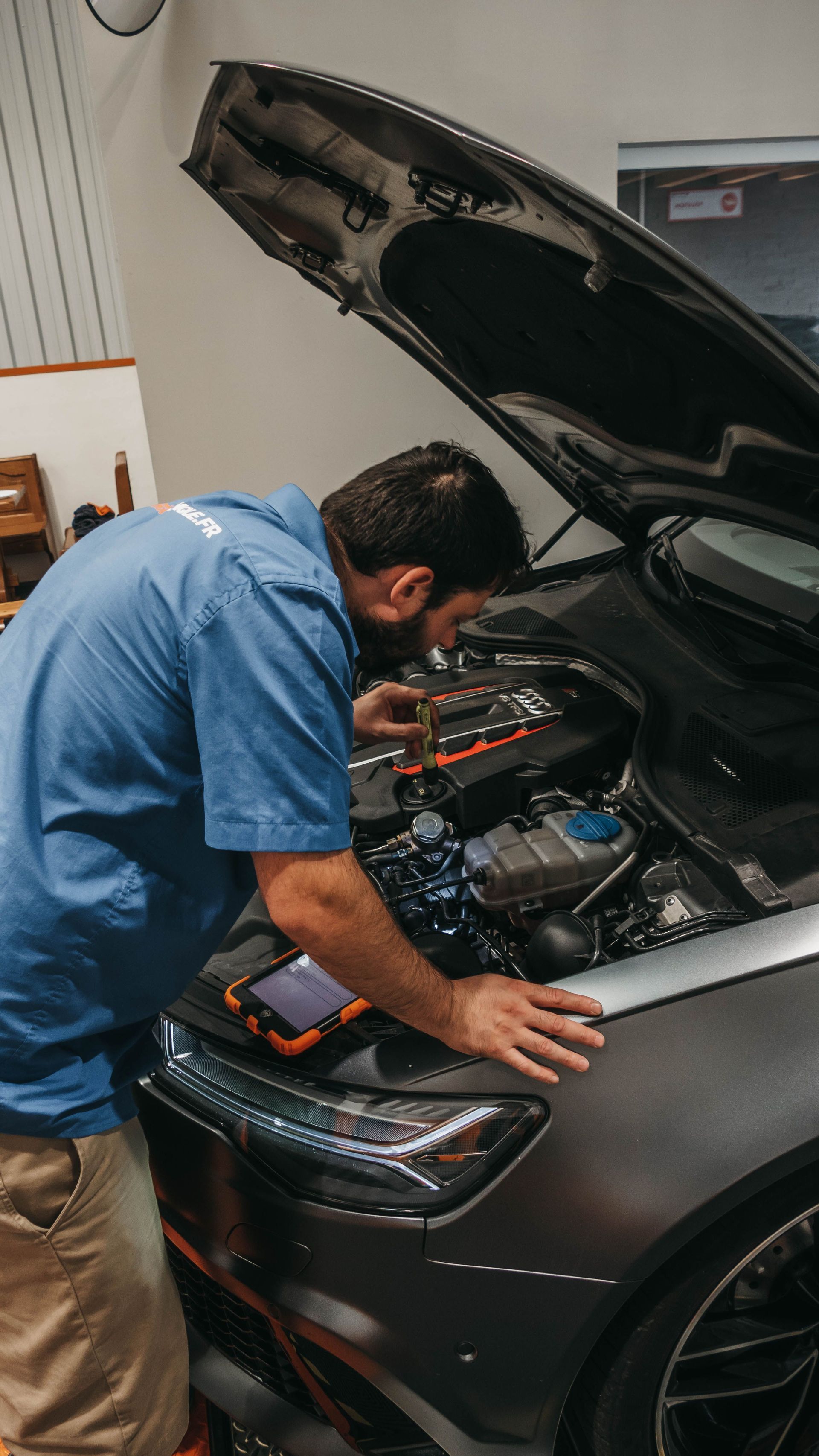 Mechanic diagnosing the car | Lyons Precision Auto Care