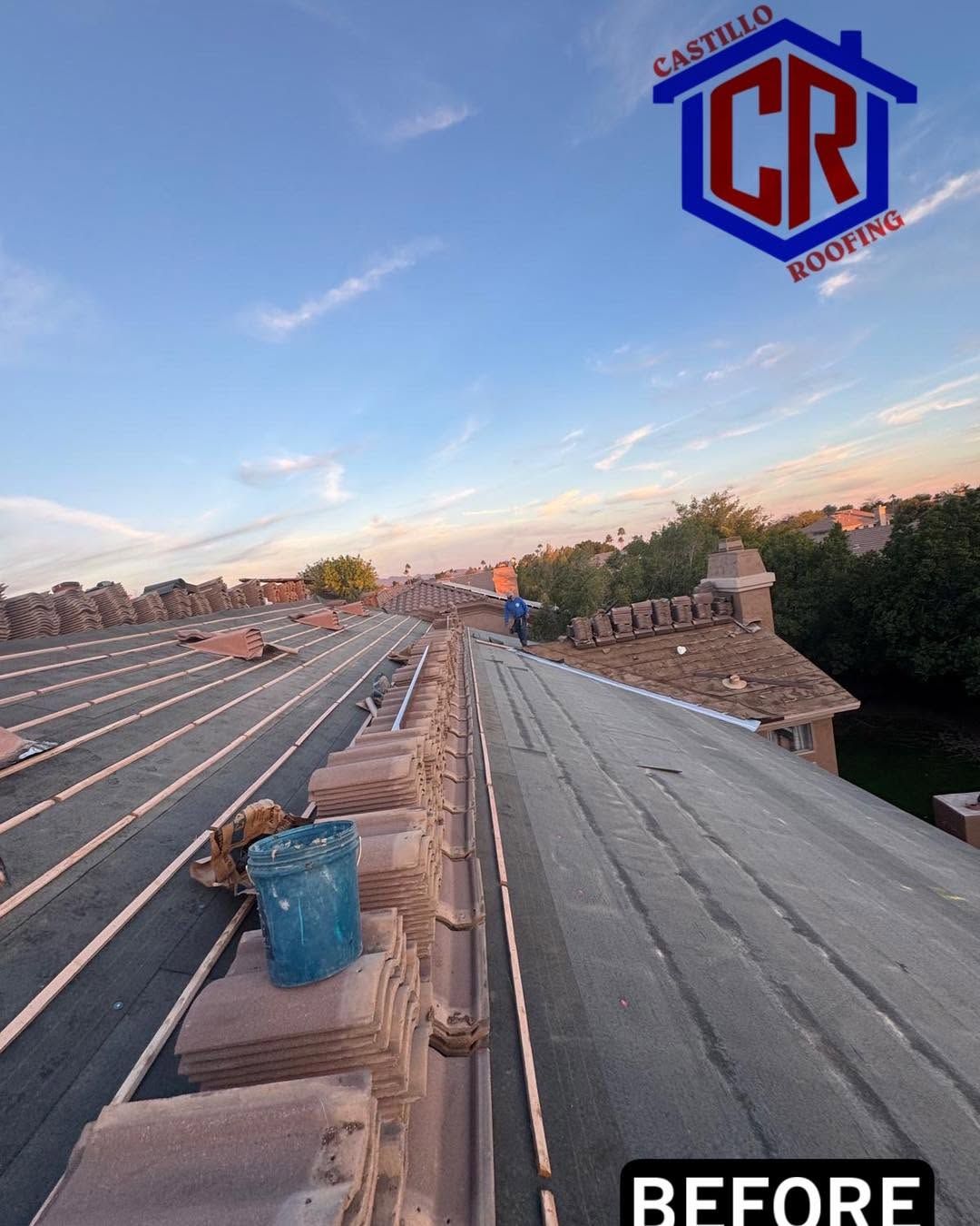 Rooftop with blue tarp and stone ridge tiles at sunset, labeled “BEFORE.”
