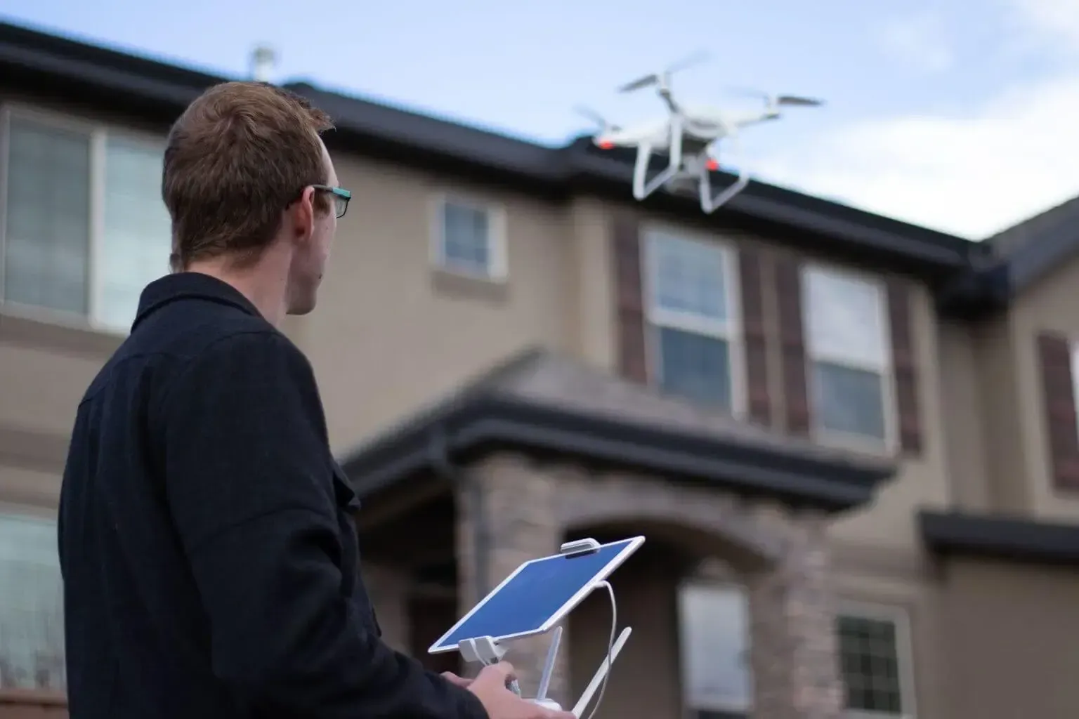 Drone operator for Express Roof Check quick roof inspection service by american remodeling corp