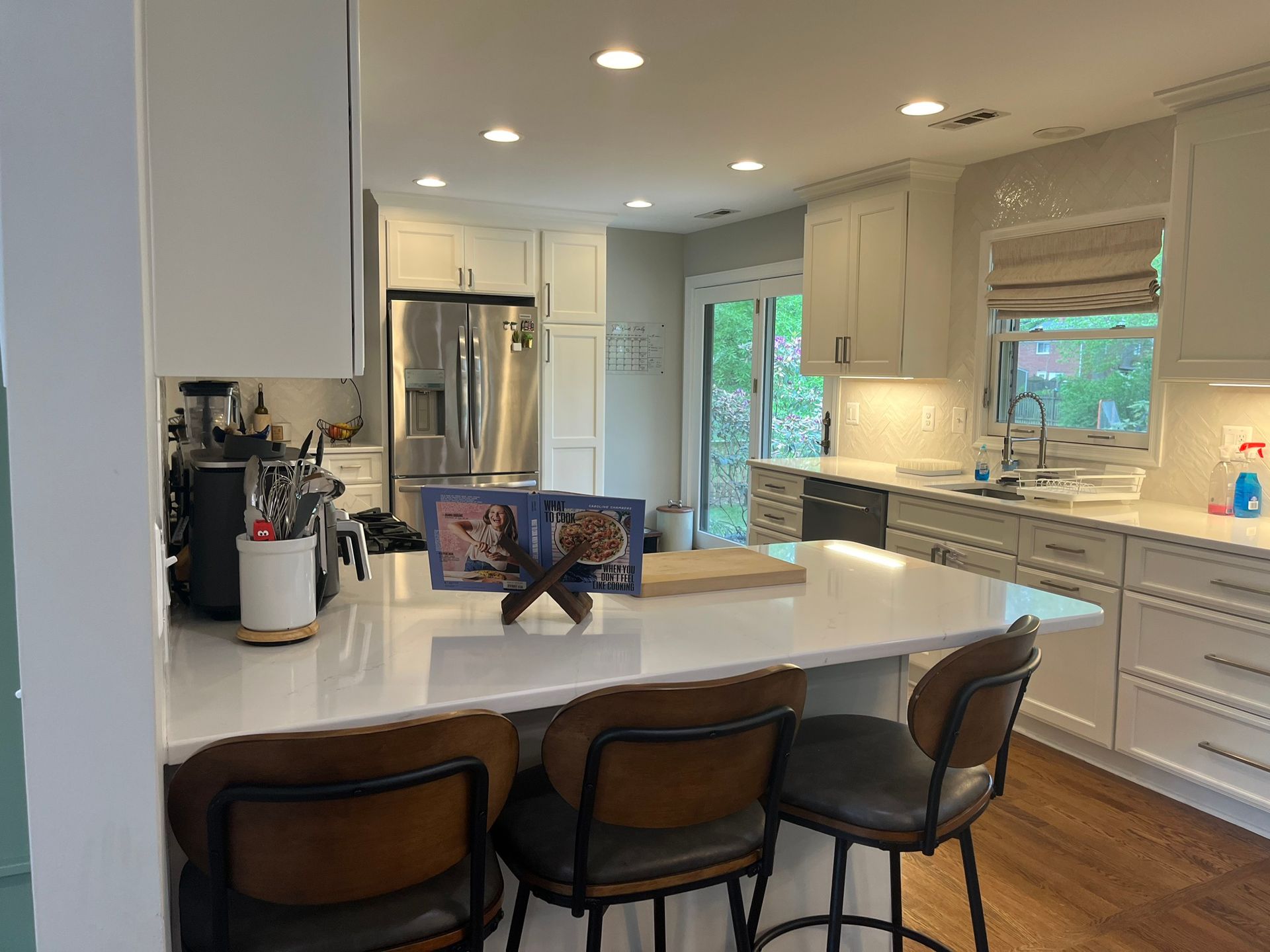 Kitchen Renovation marble countertops and custom cabinets, new lighting fixtures