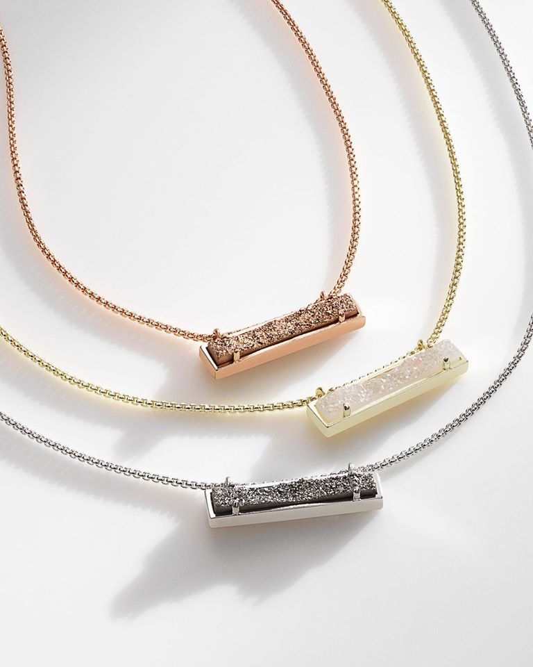 Three bar necklaces with druzy stones, in rose gold, gold, and silver.