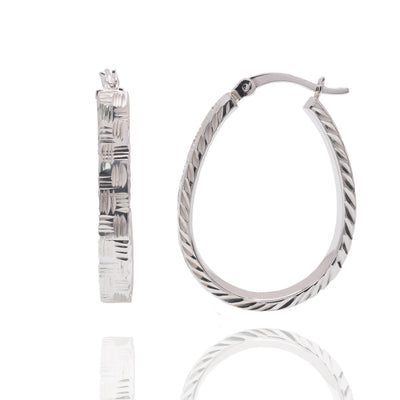 Pair of silver oval hoop earrings with textured patterns.