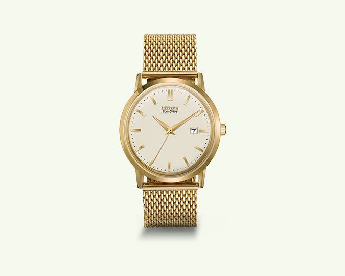 Gold wristwatch with a mesh band on a white background.