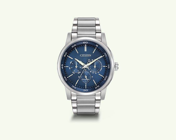 Silver wristwatch with a blue dial and silver bracelet.