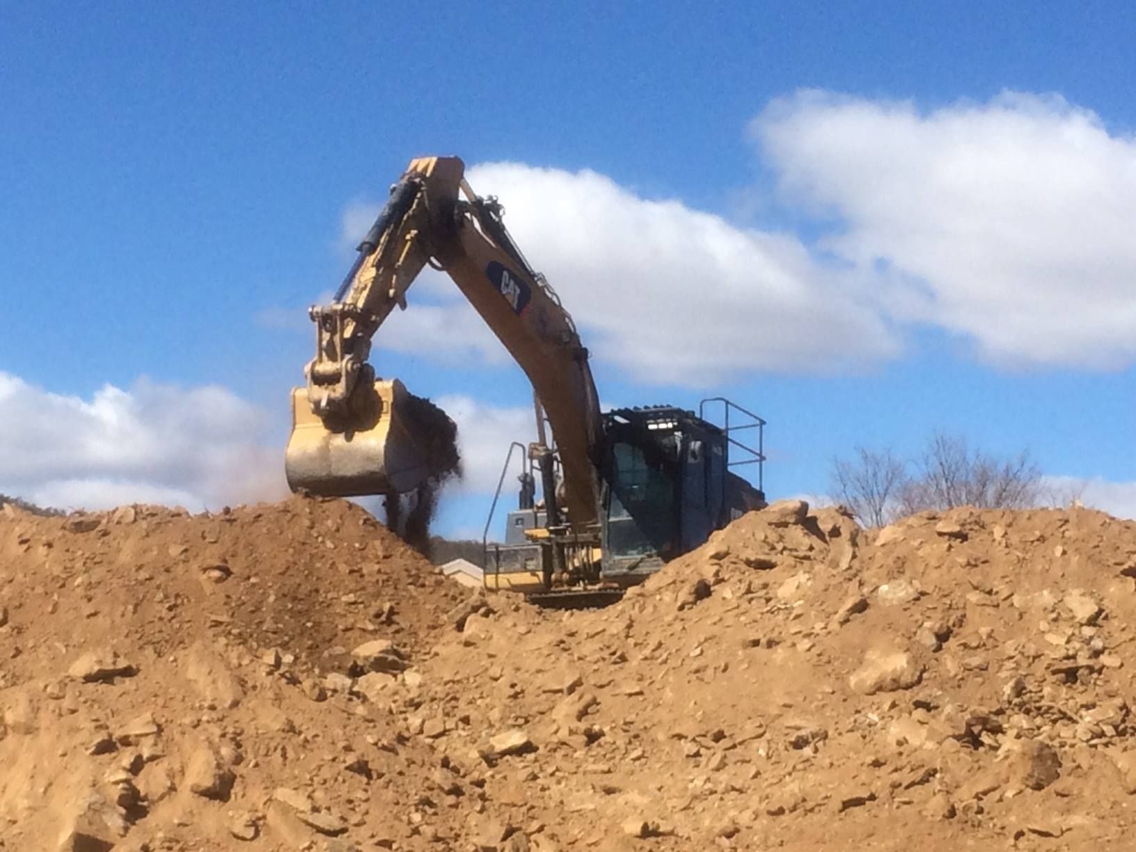 Yellow Loader Excavator — Marulan, NSW — Coopers Earthmoving Pty Ltd
