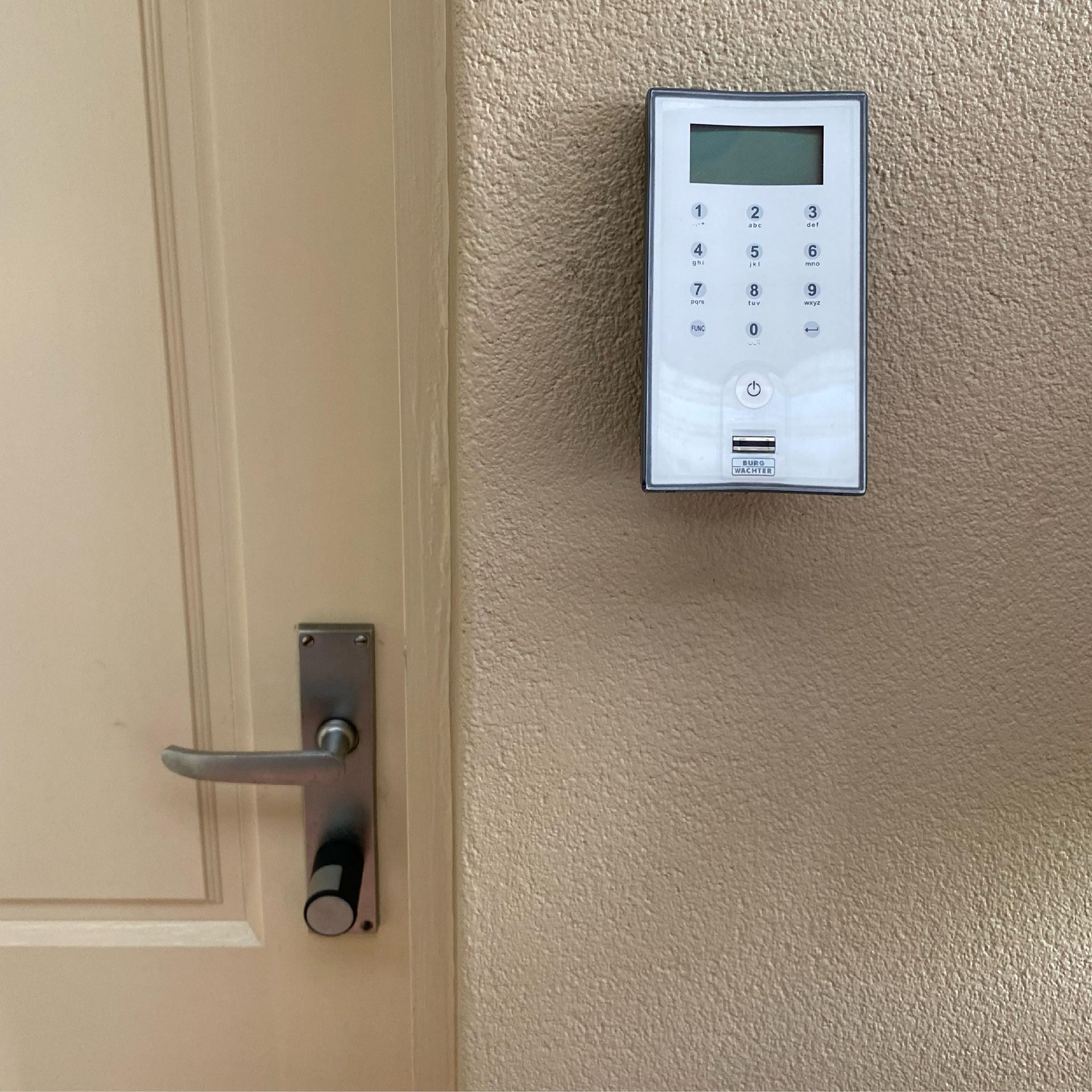 A close up of a door with a lock on it.