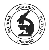 Le logo de l'institut de recherche McCrone à Chicago montre un microscope dans un cercle.