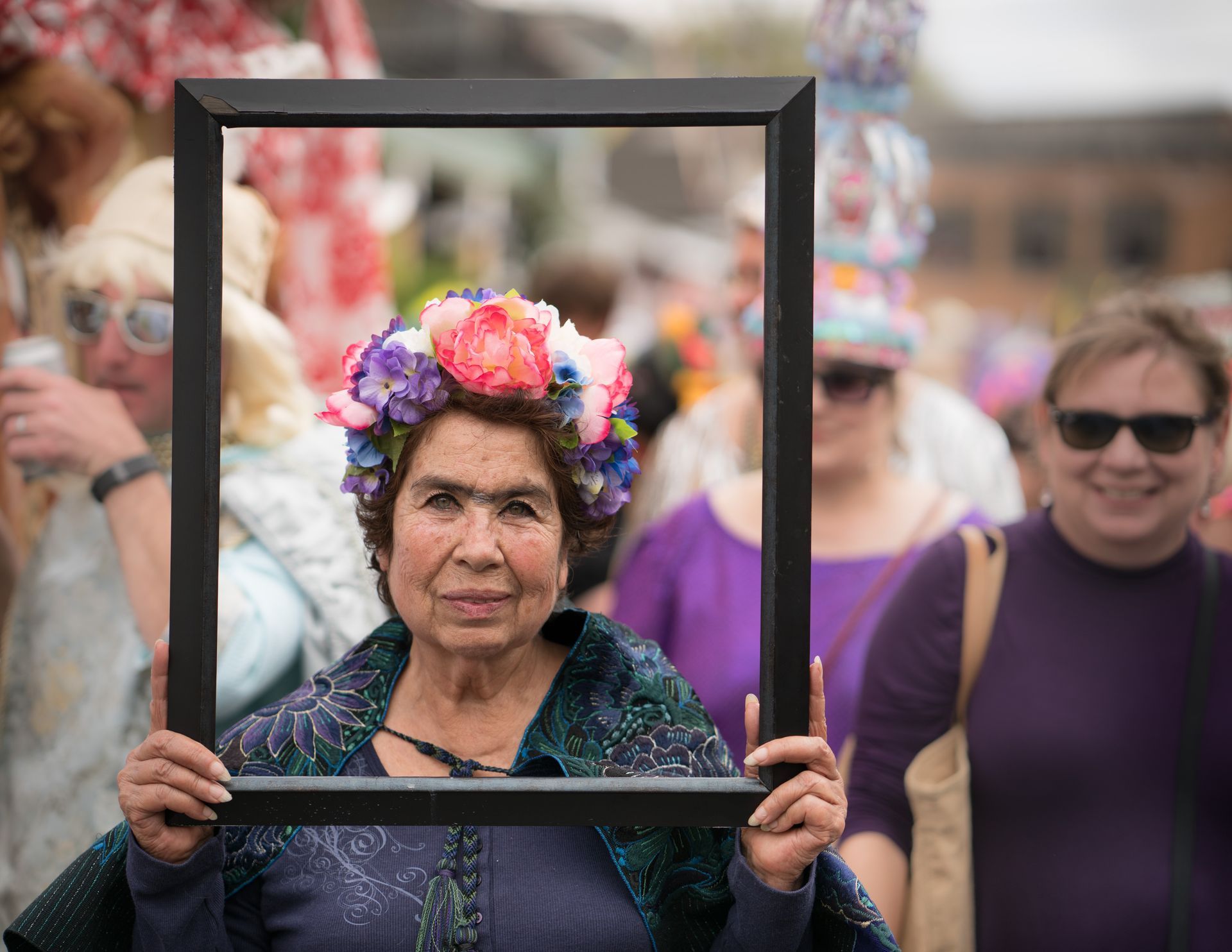 woman holding a frame