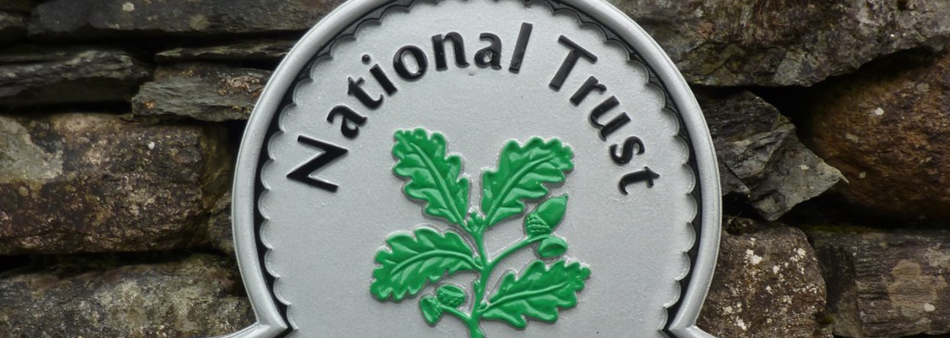 Picture of a National Trust logo on a sign.