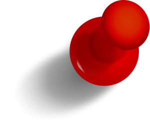 A red pin with a shadow on a white background