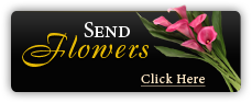 Black banner ad reading “Send Flowers” with pink flowers and “Click Here” button