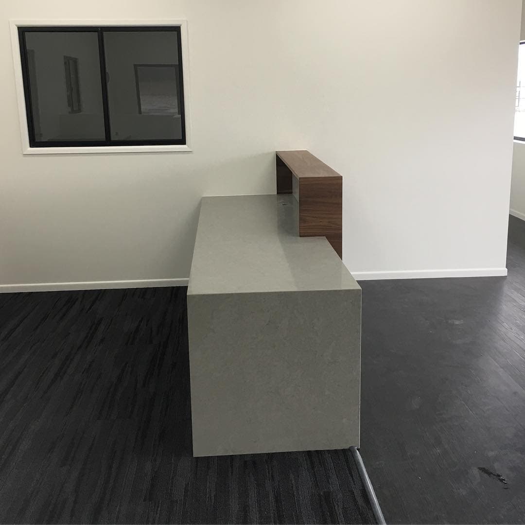 Wood and Marble Finished in Office Reception Area — Keppel Kitchens in Yeppoon, QLD