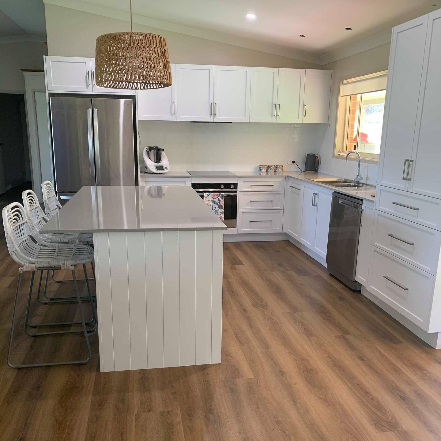 Wall Mounted White Cabinets Installed in Kitchen — Keppel Kitchens in Yeppoon, QLD