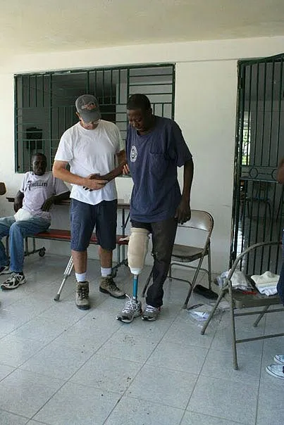 Doctor Assisting Man with Prosthetic Leg — Pembroke Pines, FL — Huse Artificial Limb & Brace