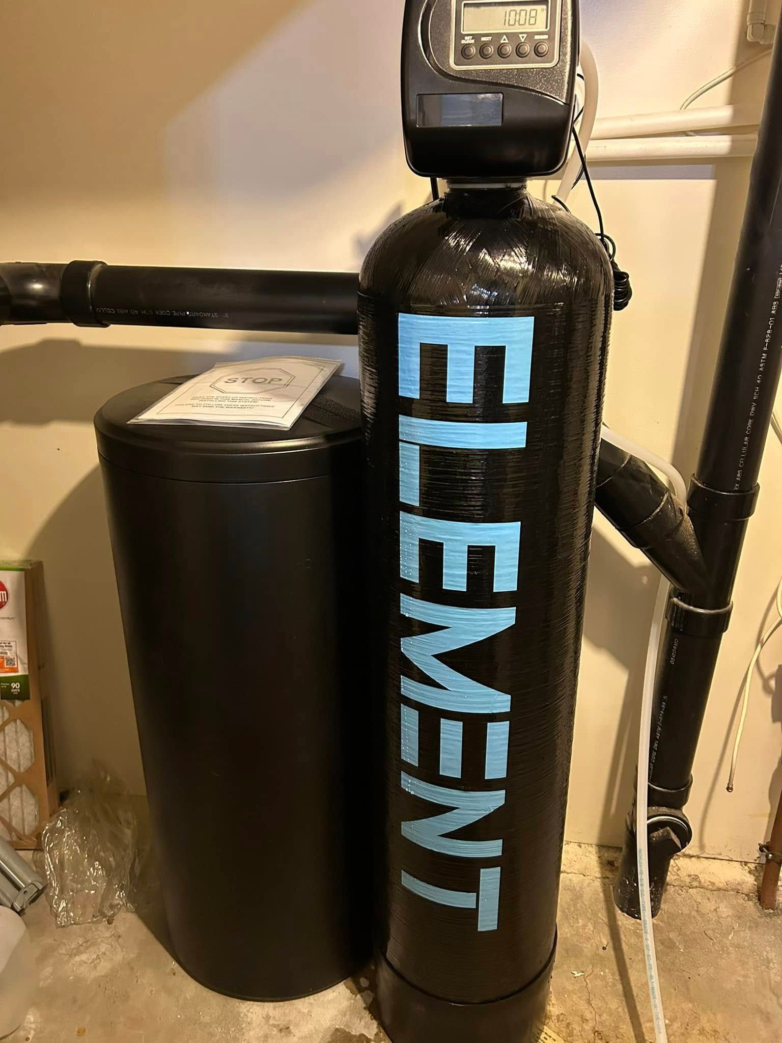 Water softener system with black tank, salt container, and digital display, labeled 