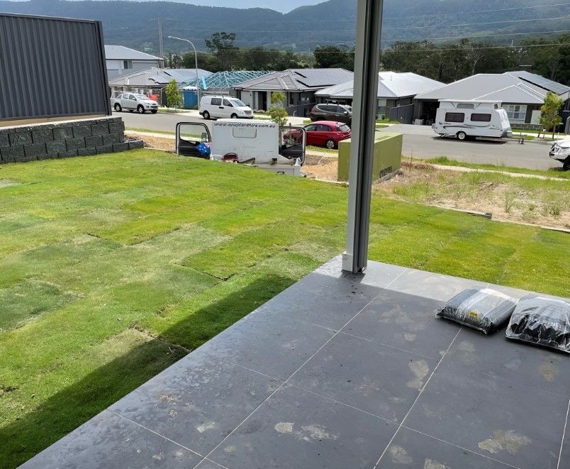 A View of a Lush Green Field From a Porch — Superior Turf in Bowral, NSW